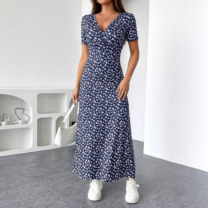 Women's fitted jersey midi dress with crossover top, short sleeves, and flared skirt StylebySassy
