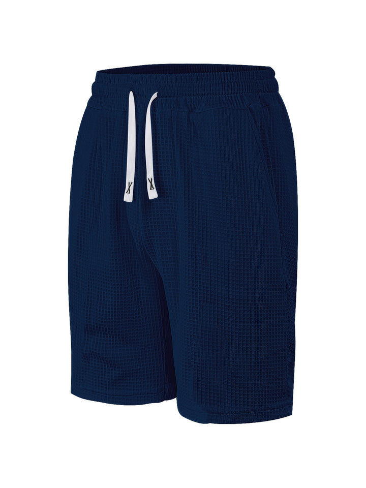 Men's breathable waffle pajama shorts with elastic comfort waistband, drawstring, and side pockets StylebySassy