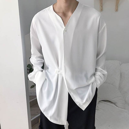 Men's loosely cut V-neck shirt with concealed button placket and band closure StylebySassy