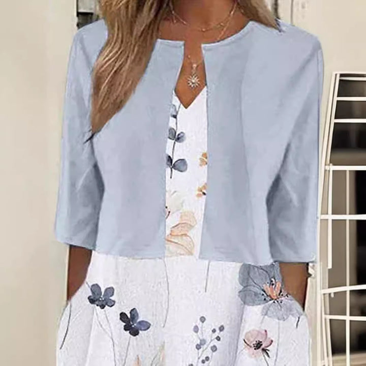 Women's maxi dress with separate bolero, V-neck, inset pockets, and floral A-line silhouette StylebySassy
