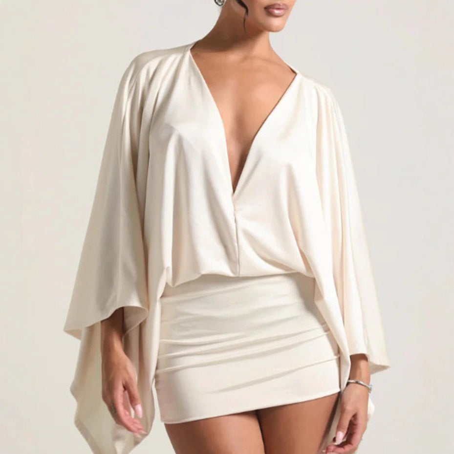 Women nan cape mini dress with deep V-neck, batwing sleeves and tailored mini skirt StylebySassy
