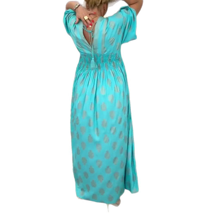 Women's gathered maxi dress with smocked waist, kimono sleeves, and decorative tassel StylebySassy