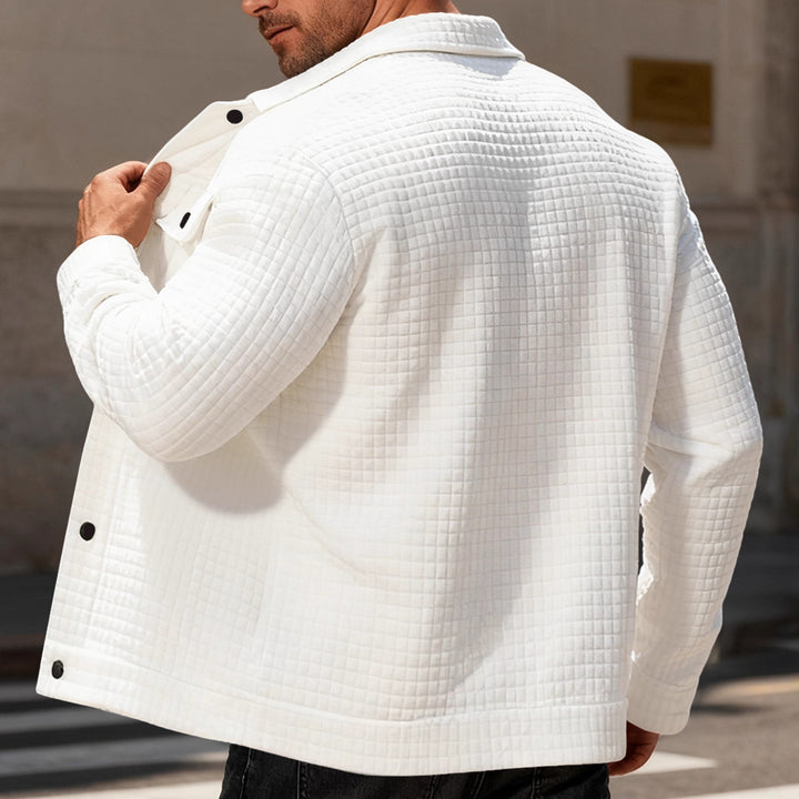 Men's quilted shirt jacket in overshirt style with snap button placket and applied chest flaps StylebySassy