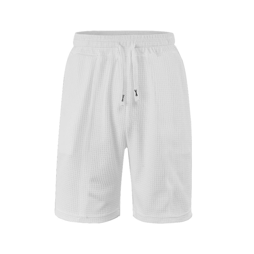 Men's breathable waffle pajama shorts with elastic comfort waistband, drawstring, and side pockets StylebySassy