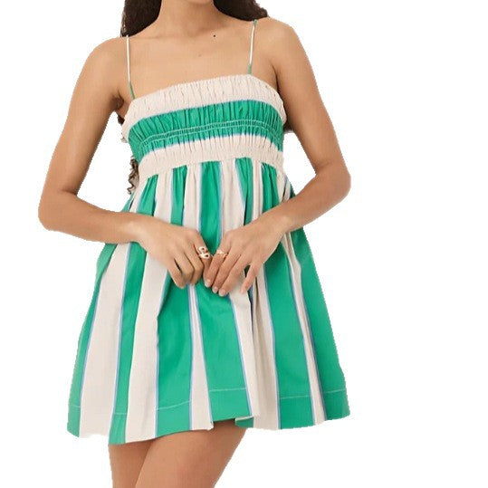 Women's short babydoll mini dress with smocked bustier, fine spaghetti straps, and flared A-line skirt StylebySassy