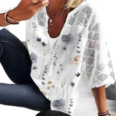 Women's V-neck tunic with lace-knit sleeves and subtle watercolor floral print StylebySassy