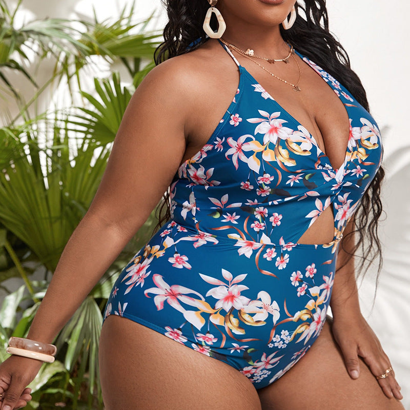 Women's one-piece swimsuit with floral wrap design StylebySassy