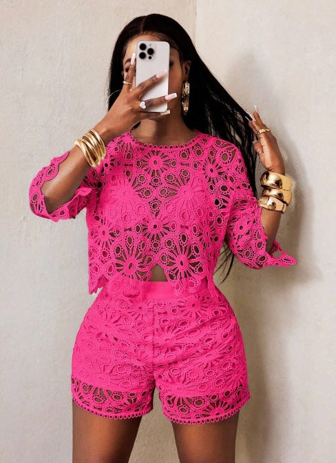 Women's airy crochet two-piece set with floral lace, short top and high-waisted tailored pants StylebySassy