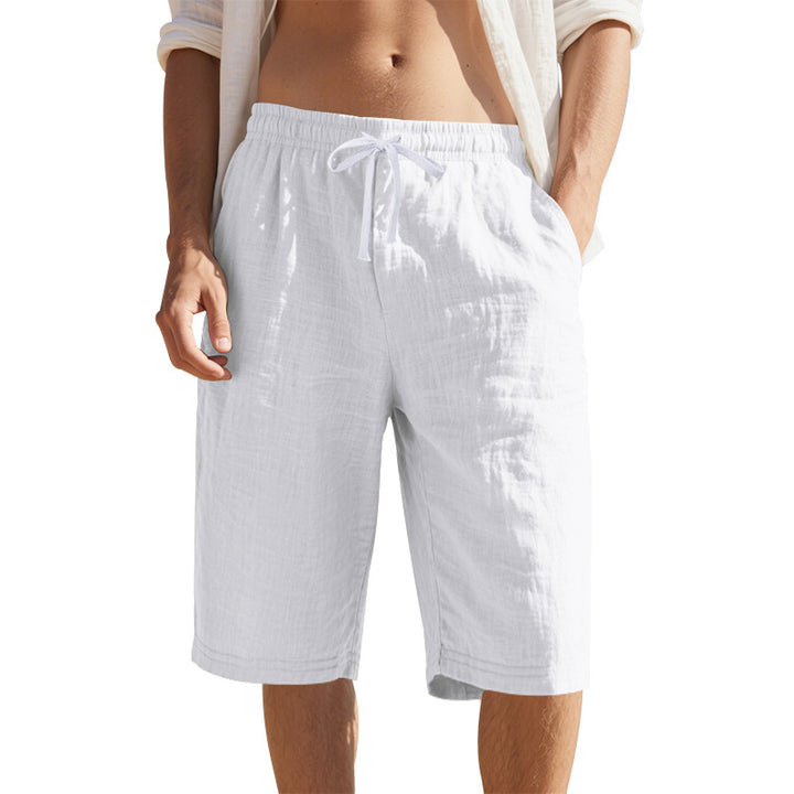 Men's knee-length Bermuda shorts made of crinkled muslin with elastic tunnel drawstring waistband and side pockets StylebySassy
