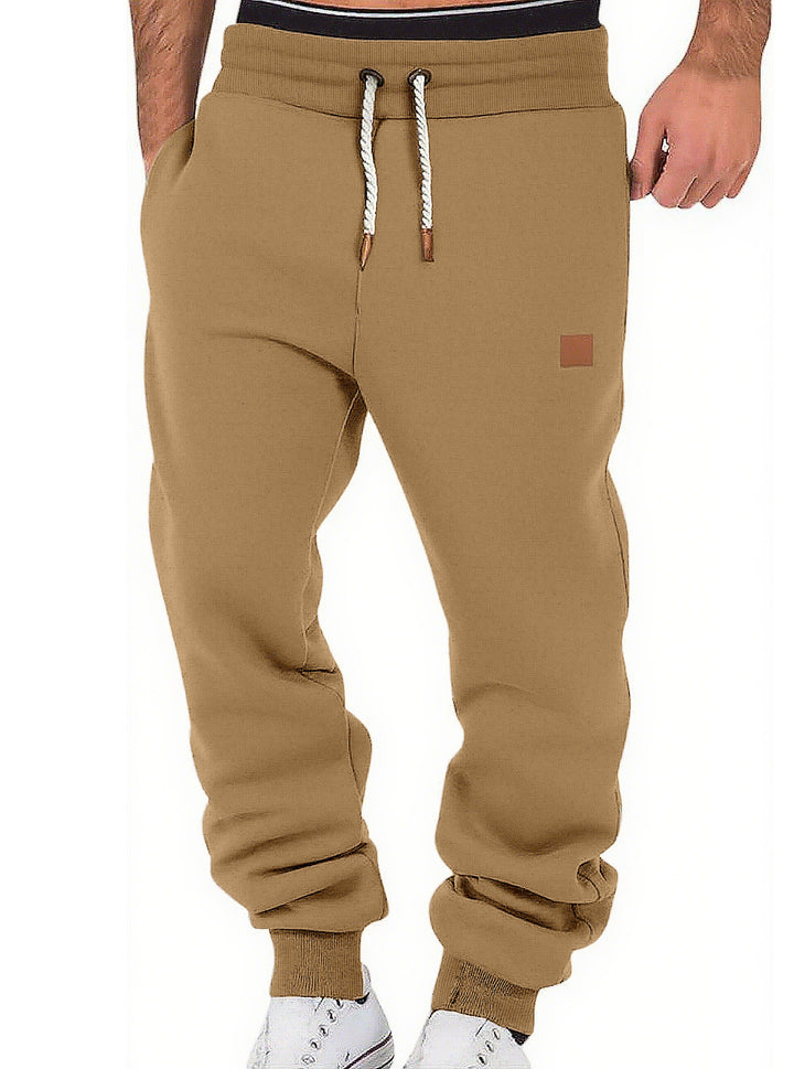 Men's comfortable jogging pants made of high-quality cotton blend with elastic waistband, drawstring, and cuffs StylebySassy