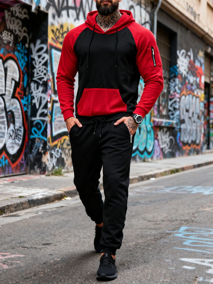 Men's two-piece hooded sweat set with raglan sleeves, sleeve zip pocket, and tapered jogging pants StylebySassy