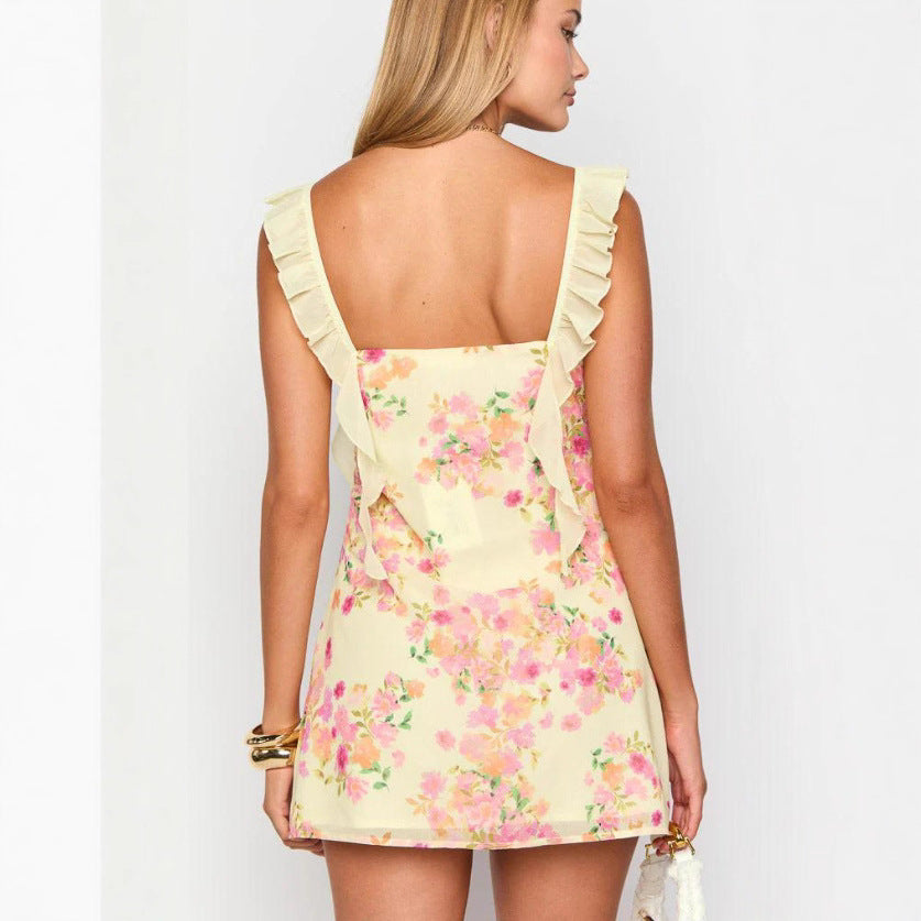 Ladies' tailored mini dress with ruffled straps, bow detail at the décolletage and floral pattern StylebySassy
