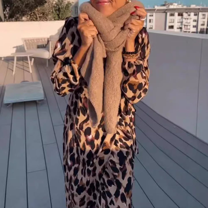 Women’s wrap midi dress with animal print, V-neck, waist belt, and asymmetrical ruffle StylebySassy