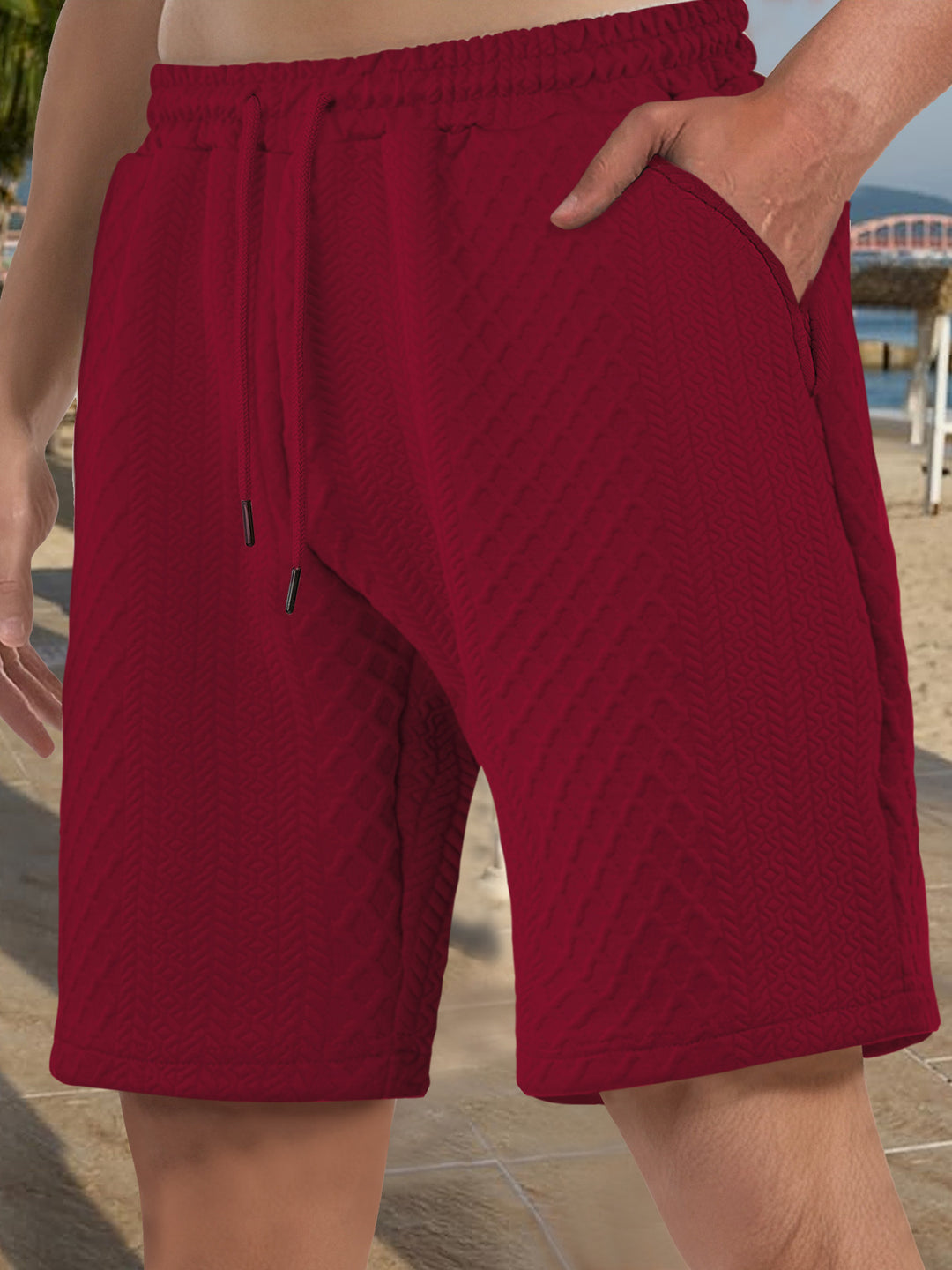 Men's textured beach bermuda shorts made of waffle jersey with elastic drawstring waistband and slanted pockets StylebySassy