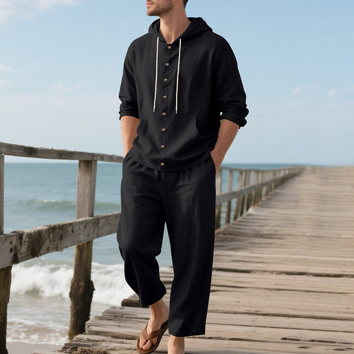 Men's casual linen-cotton ensemble with hooded top and full button placket, kangaroo pocket, and ankle-length wide trousers StylebySassy
