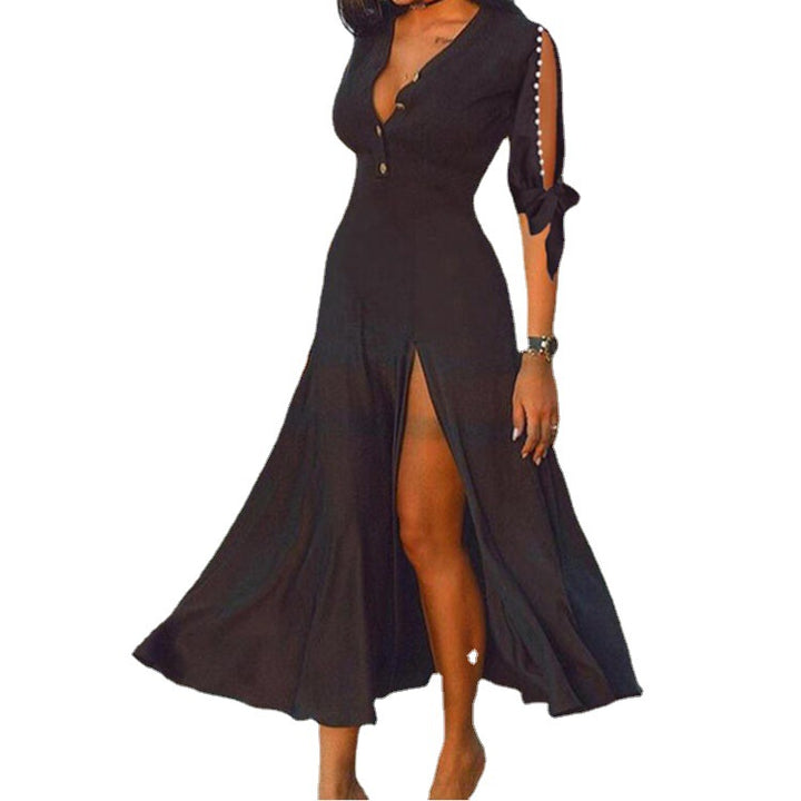 Women's maxi dress in evening look with deep V-neck, high front slits and knotted cut-out sleeves StylebySassy