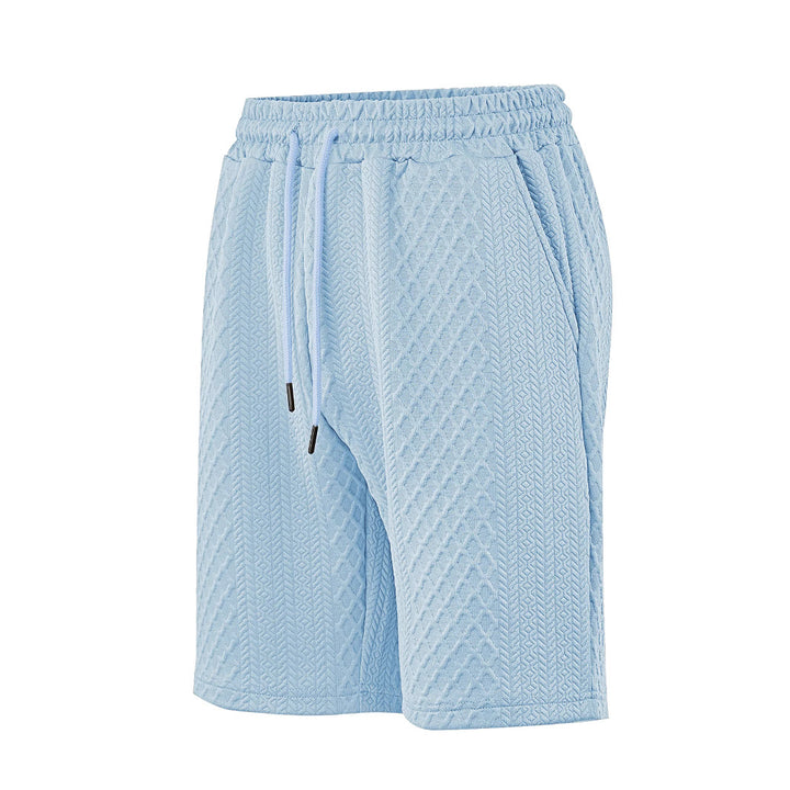 Men's textured beach bermuda shorts made of waffle jersey with elastic drawstring waistband and slanted pockets StylebySassy