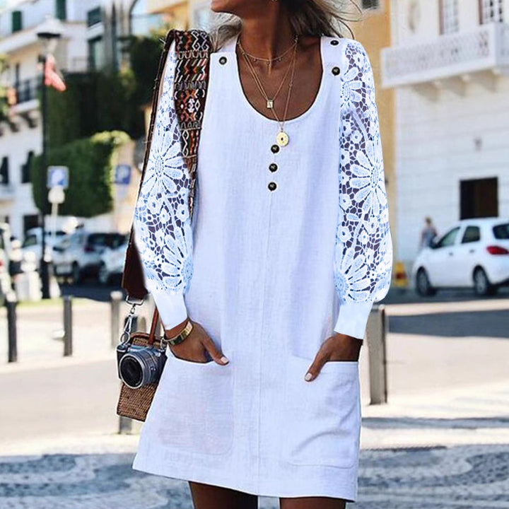 Women's relaxed linen mini dress with floral crochet sleeves, U-neckline and patch pockets StylebySassy