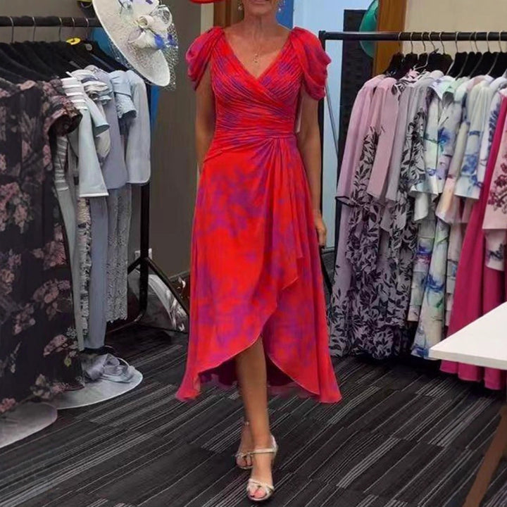 Women's wrap midi dress with ruched bodice, puff sleeves, and asymmetric waterfall hem StylebySassy