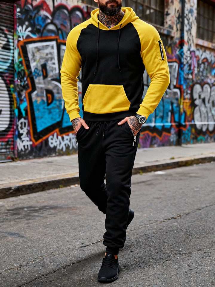 Men's two-piece hooded sweat set with raglan sleeves, sleeve zip pocket, and tapered jogging pants StylebySassy