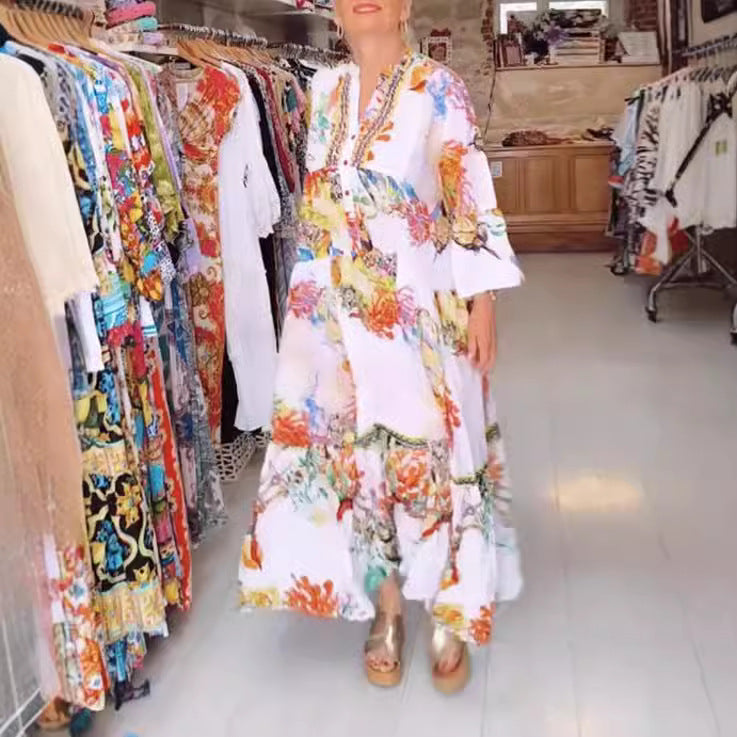 Women's airy maxi dress in layered look with V-neck, button placket, and three-quarter bell sleeves StylebySassy