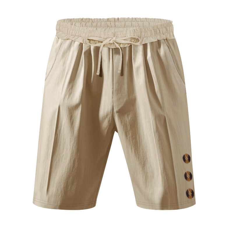 Men's knee-length casual Bermuda shorts with elastic tunnel drawstring waist, side slit pockets, and round decorative appliqués StylebySassy