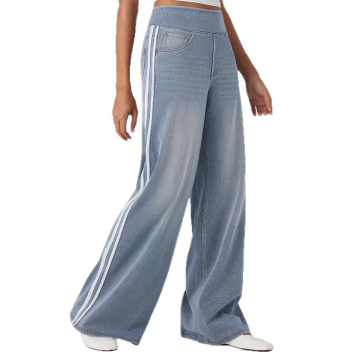 Women's casual wide jogging pants in denim look with elastic comfort waistband, contrasting side stripes and pockets StylebySassy