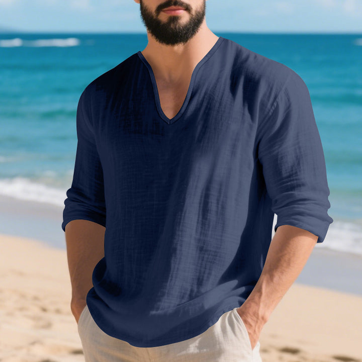Men's lightweight linen V-neck shirt with a loose fit and roll-up sleeves StylebySassy