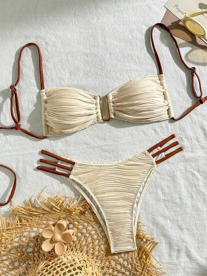 Women's triangle bikini with elegant gathering design and trendy strap details StylebySassy