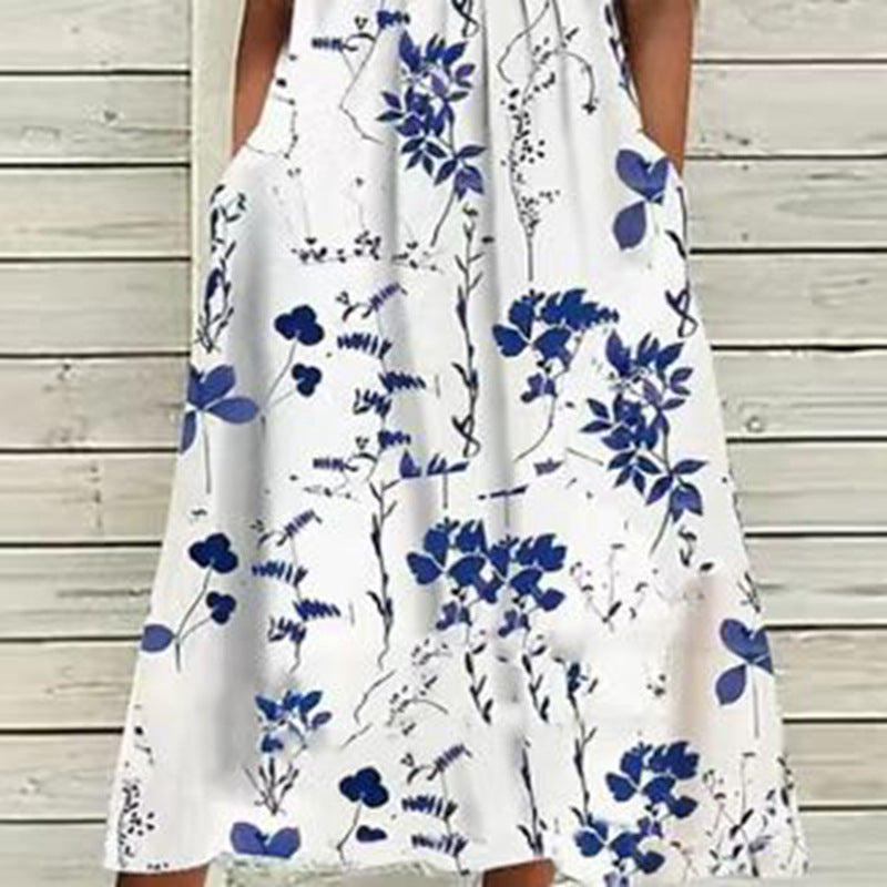 Ladies' airy A-line midi dress with lace sleeves, side pockets, and round neckline StylebySassy