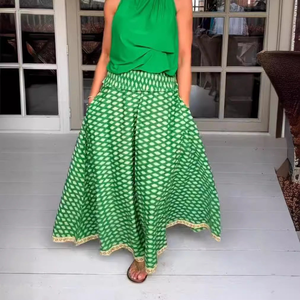 Women's two-piece halter neck set with gathered stand collar and patterned maxi skirt with elastic smocked waistband StylebySassy