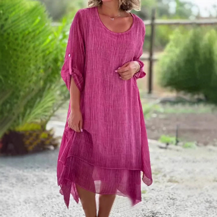 Ladies wide muslin midi dress with round neckline, roll-up half-length sleeves, and layered tiered skirt StylebySassy