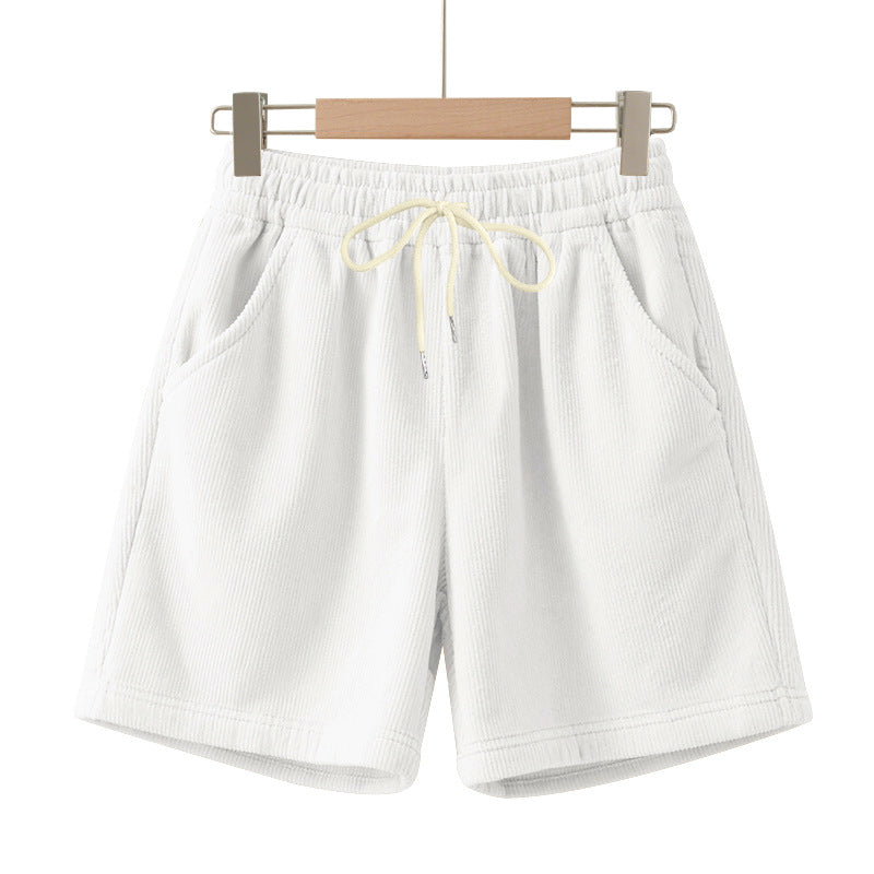 Men's ribbed jersey shorts with elastic waistband, decorative drawstring, and side slant pockets StylebySassy