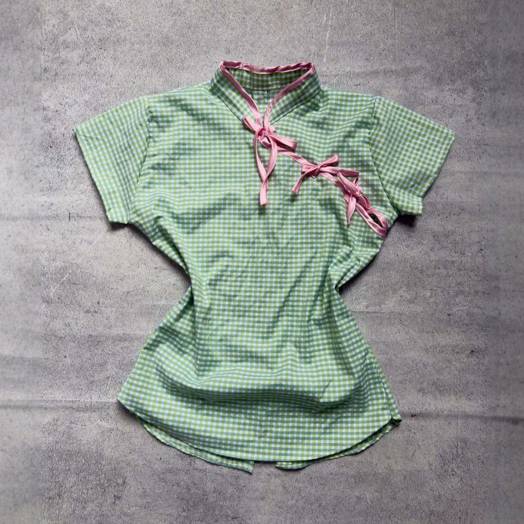Women’s Chinese short-sleeve shirt with playful check pattern and decorative bows