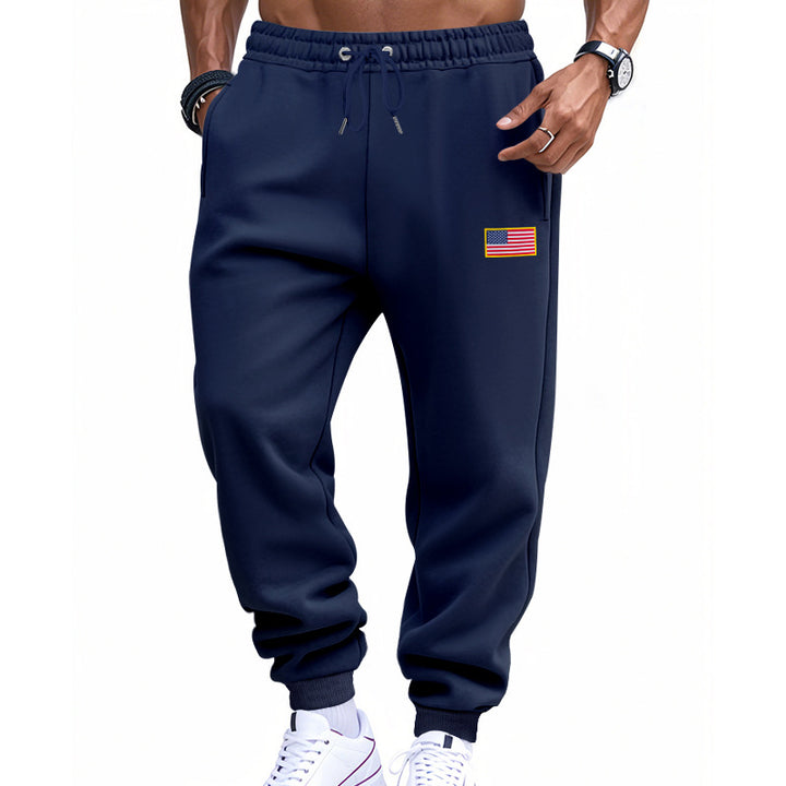 Men's slim-fit sweatpants with tapered leg, elastic drawstring waistband, and discreet flag application StylebySassy