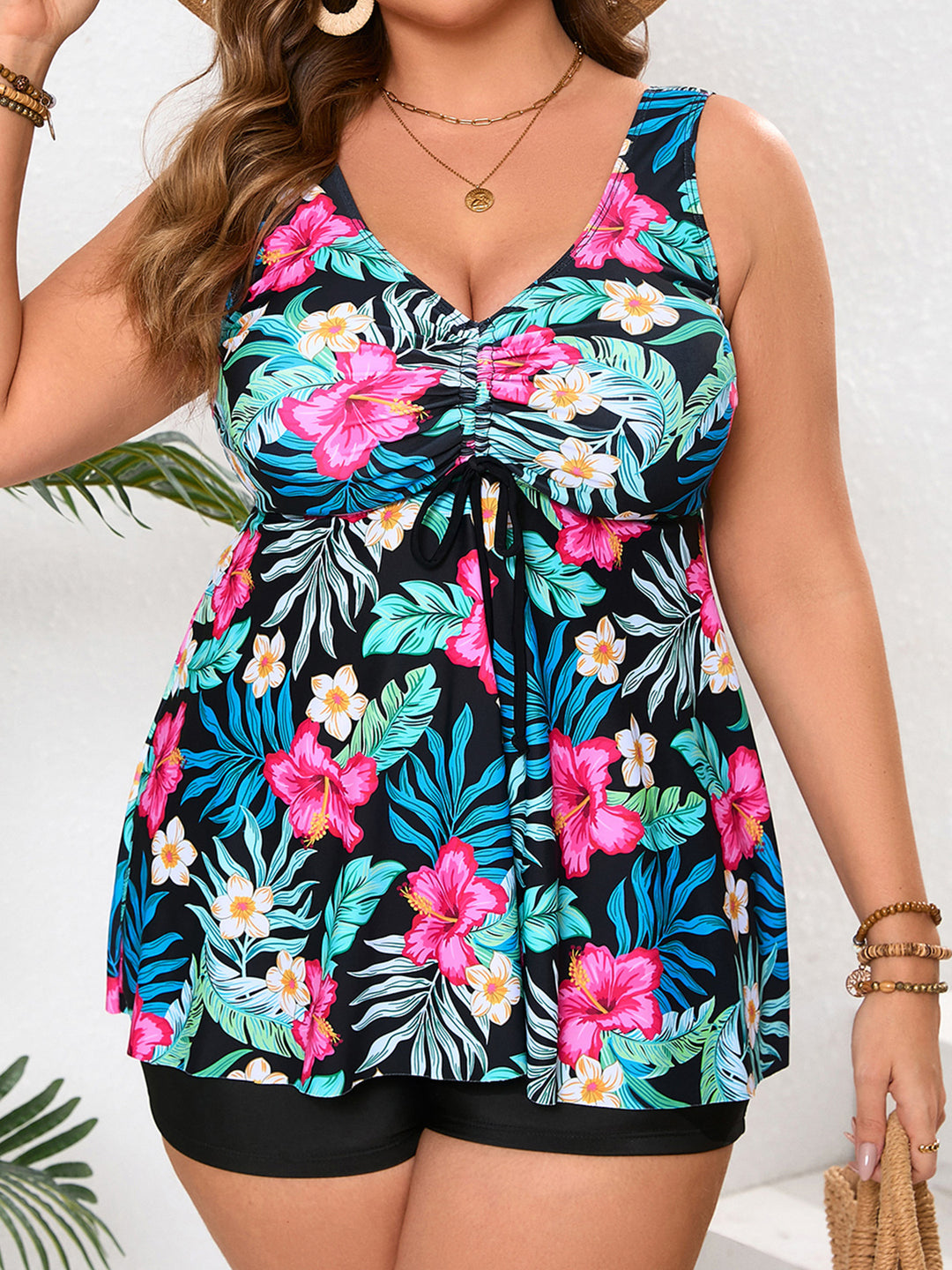 Women's tankini with floral wrap design and integrated shorts StylebySassy