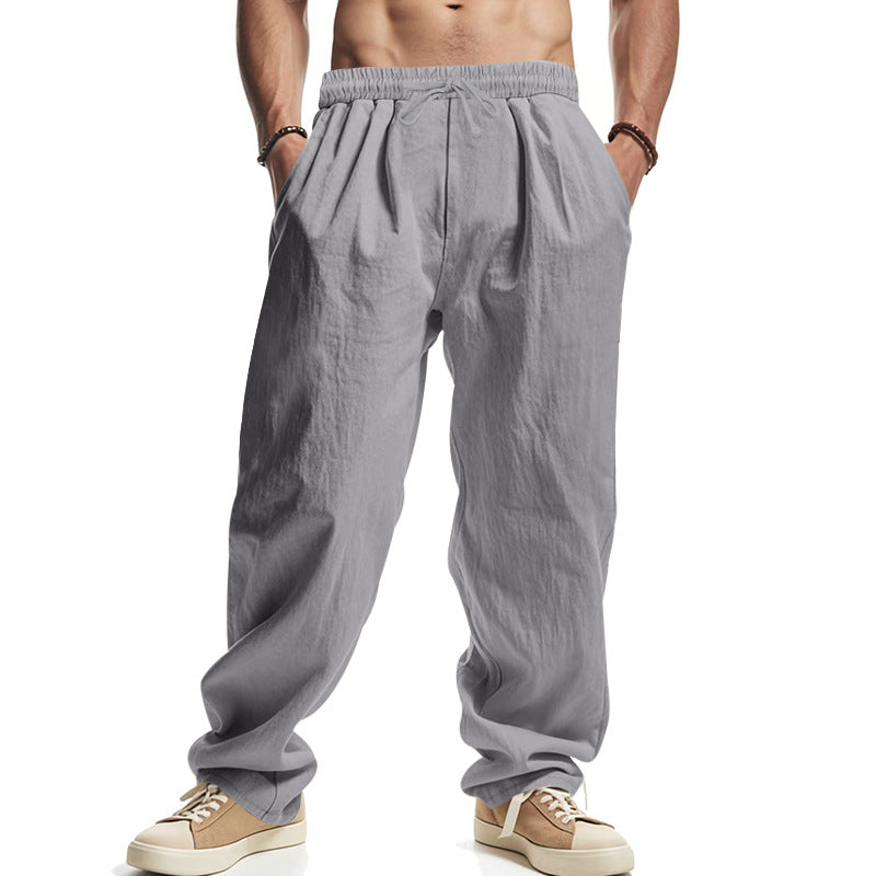 Men's loose leisure pants with elastic waistband, drawstring, and deep side pockets StylebySassy