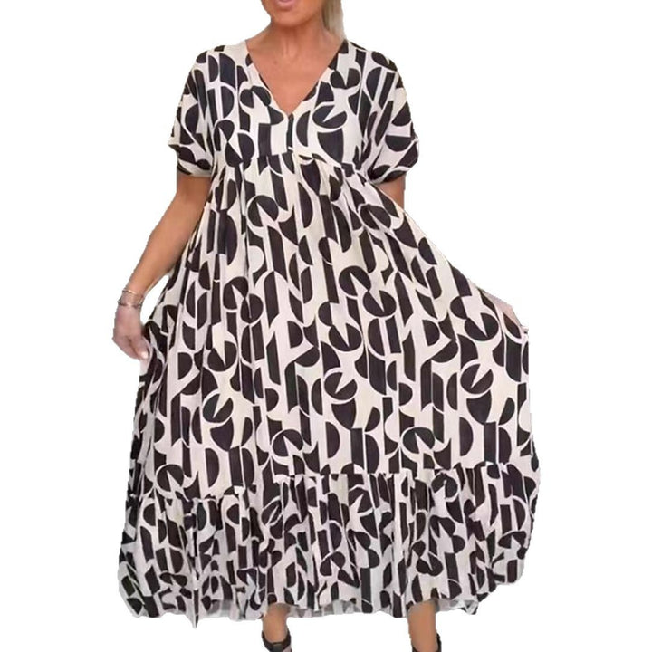 Women's voluminous maxi dress with under-bust seam, V-neck, short kimono sleeves, and tiered ruffle StylebySassy