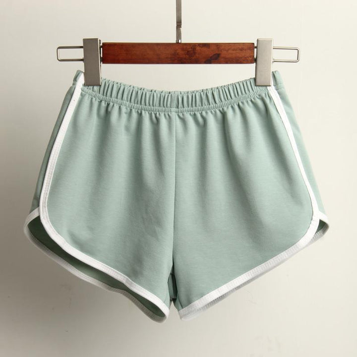 Women's sporty shorts with elastic waistband and contrasting stripes StylebySassy