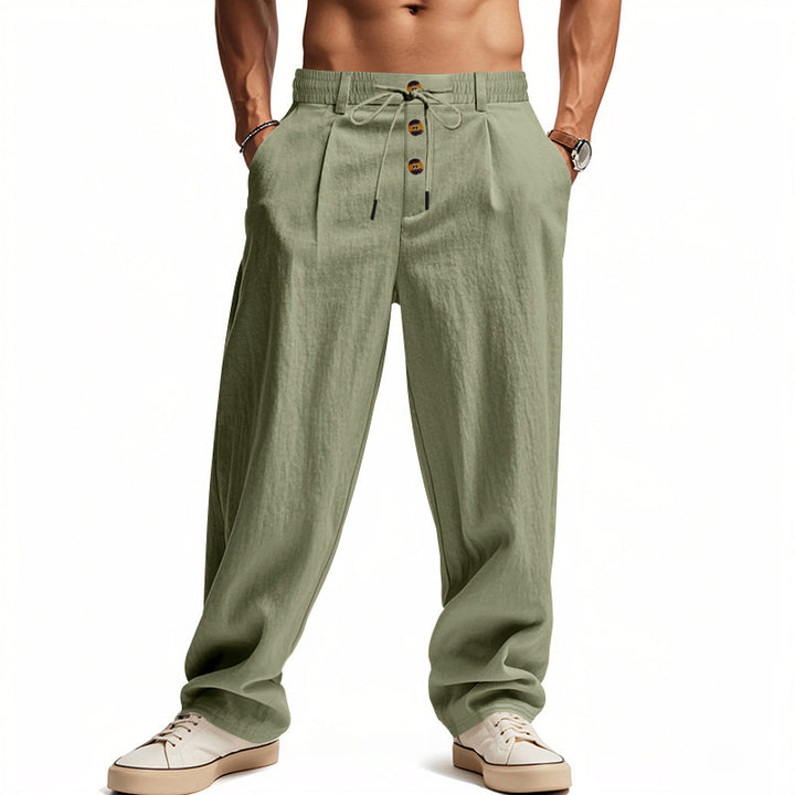 Men's casual pleated pants in linen look with elastic tunnel drawstring, decorative button placket, and deep side pockets StylebySassy