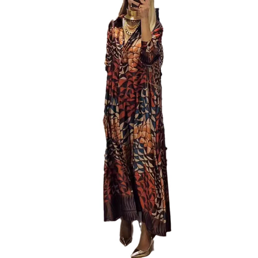 Women's flowing satin shirt dress with shirt collar, geometric mosaic print, and casual maxi length StylebySassy