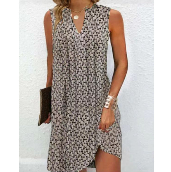 Women's casual swing summer dress with notch neckline, side pockets, and asymmetrical hem StylebySassy