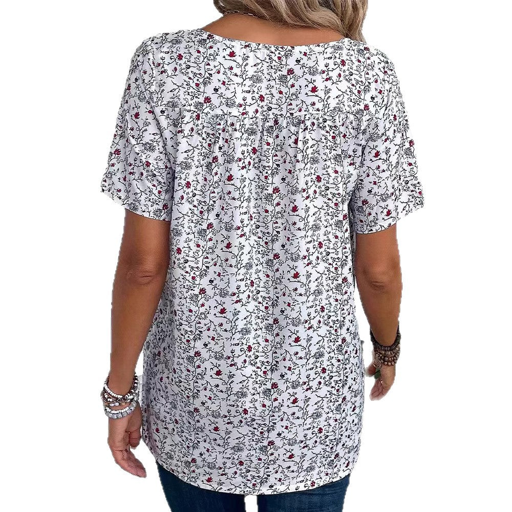 Ladies casual short-sleeve tunic shirt with round neckline, delicate all-over floral print and decorative chest pleats StylebySassy