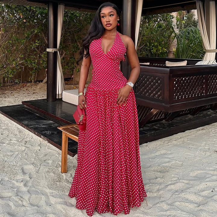 Ladies long halter dress with deep V-neck, tailored empire seam and flared layered skirt StylebySassy