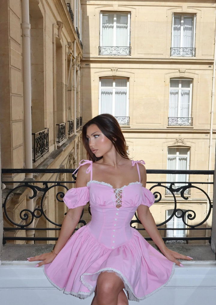 Women playfully cut mini dress with ruffle details StylebySassy