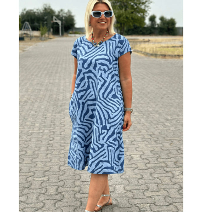 Women knee-length A-line midi dress with textured jacquard look and round neckline StylebySassy