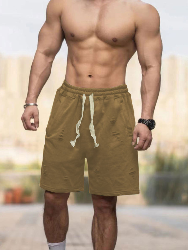 Men's casual sweat shorts with elastic drawstring waistband, side pockets, and used look StylebySassy