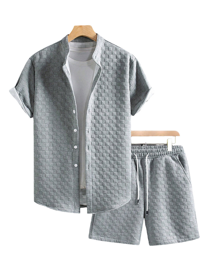 Men's two-piece summer ensemble with stand-up collar shirt jacket and elastic comfort shorts in embossed checked texture StylebySassy