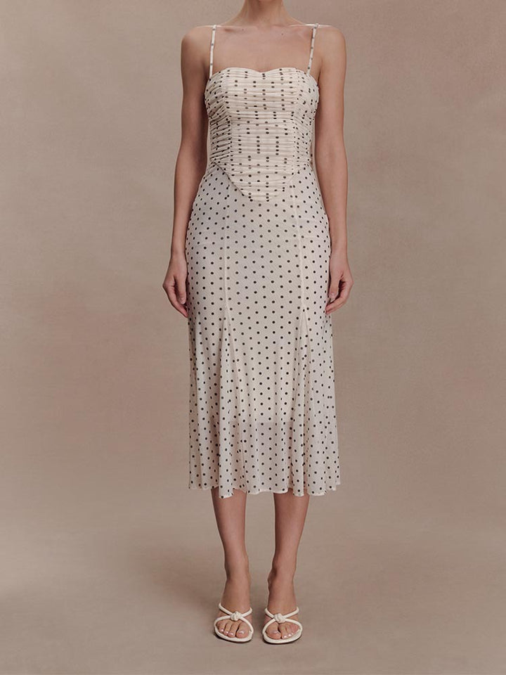 Women's midi party dress with ruffle details and transparent fabric structure StylebySassy