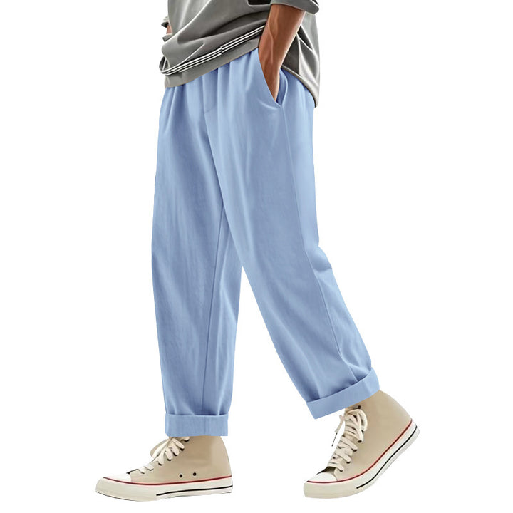 Men's wide pleat chino pants with cuffs, tapered fit and side pockets StylebySassy